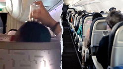 Passenger's bizarre use of drinking glass on flight leaves travelers horrified Education WA